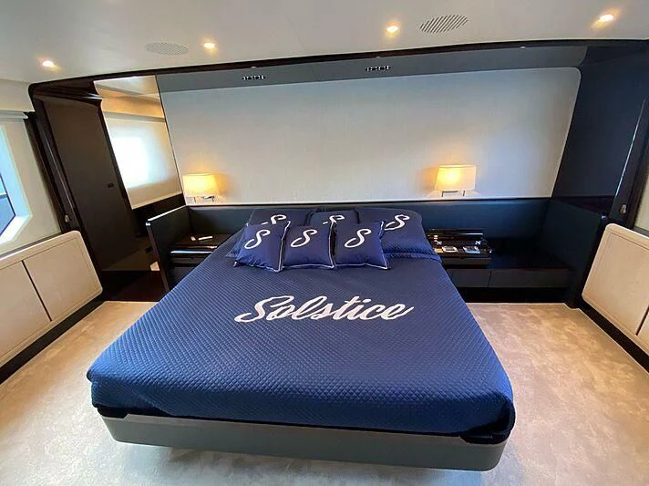 a bed in a room aboard SOLSTICE Yacht for Sale