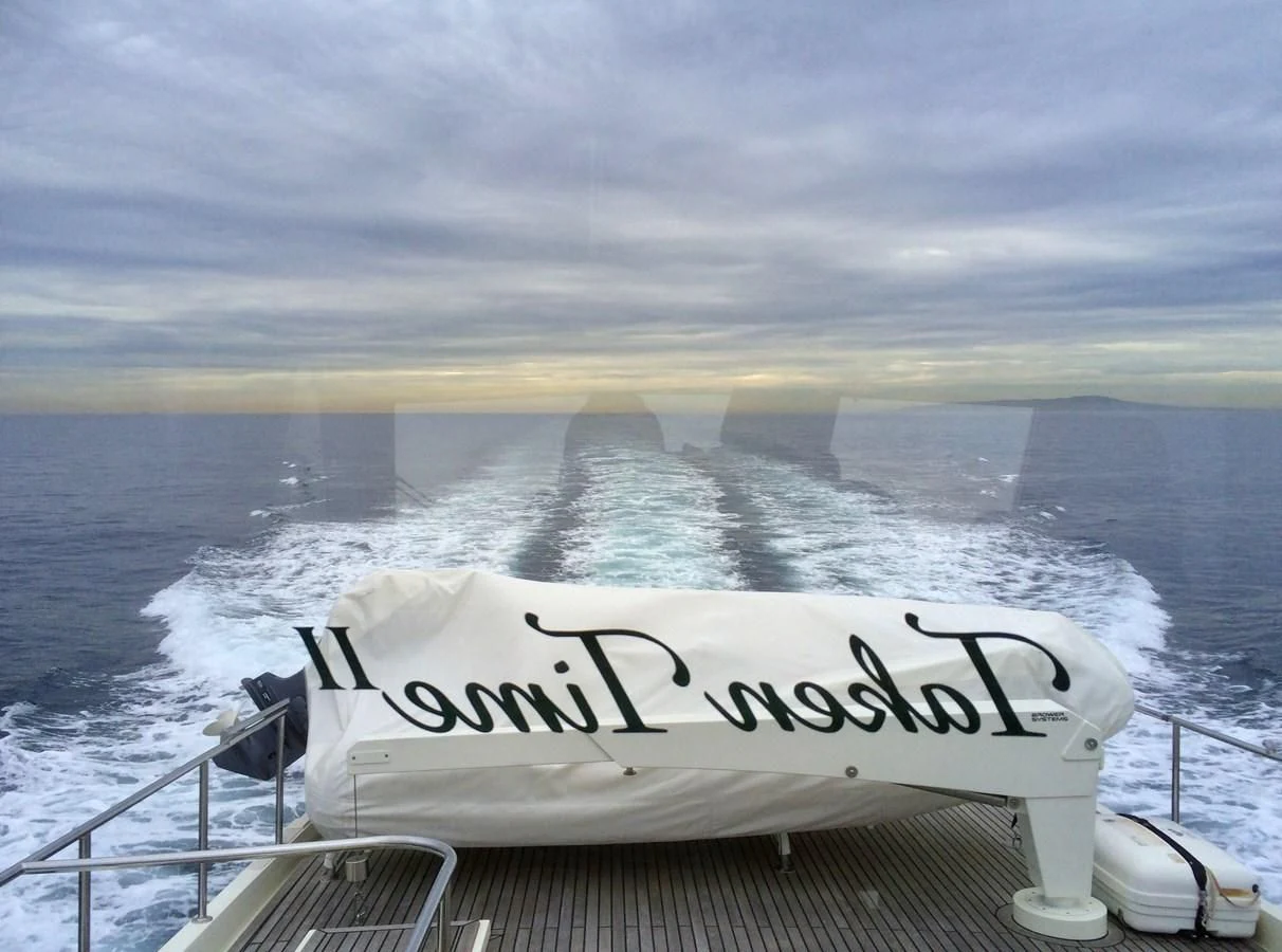 a boat on the water aboard TAKEN TIME II Yacht for Sale