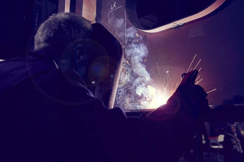 a person holding a microphone and a drum set in front of a crowd aboard CINDERELLA NOEL IV Yacht for Sale