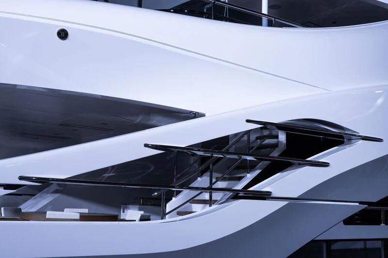 a white building with a metal railing aboard CINDERELLA NOEL IV Yacht for Sale