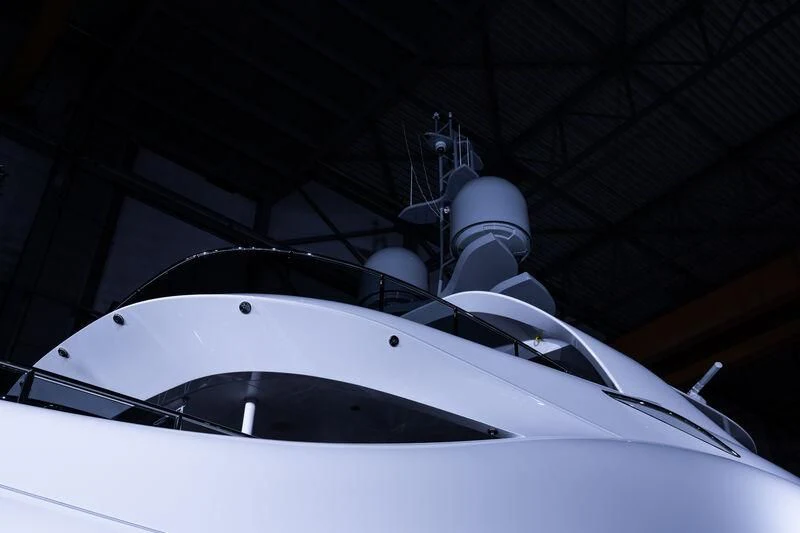 a white boat in a building aboard CINDERELLA NOEL IV Yacht for Sale