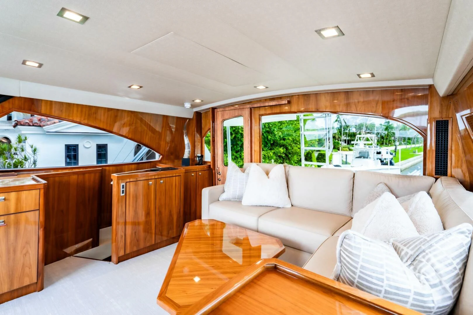 a living room with a large window aboard FRIGATE Yacht for Sale
