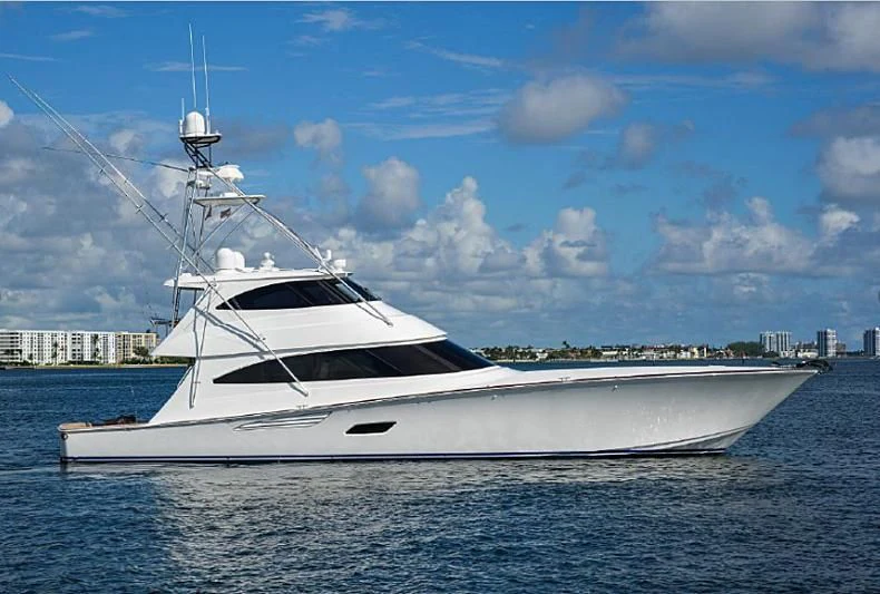 a white yacht in the water aboard FRIGATE Yacht for Sale