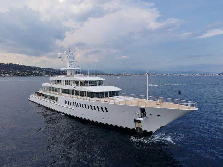 a large white boat in the water aboard MUSASHI Yacht for Sale