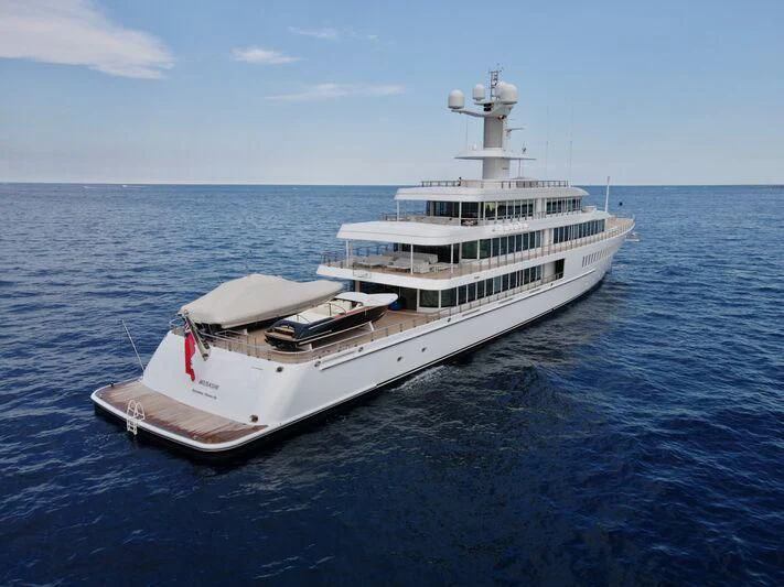 a white yacht in the water aboard MUSASHI Yacht for Sale