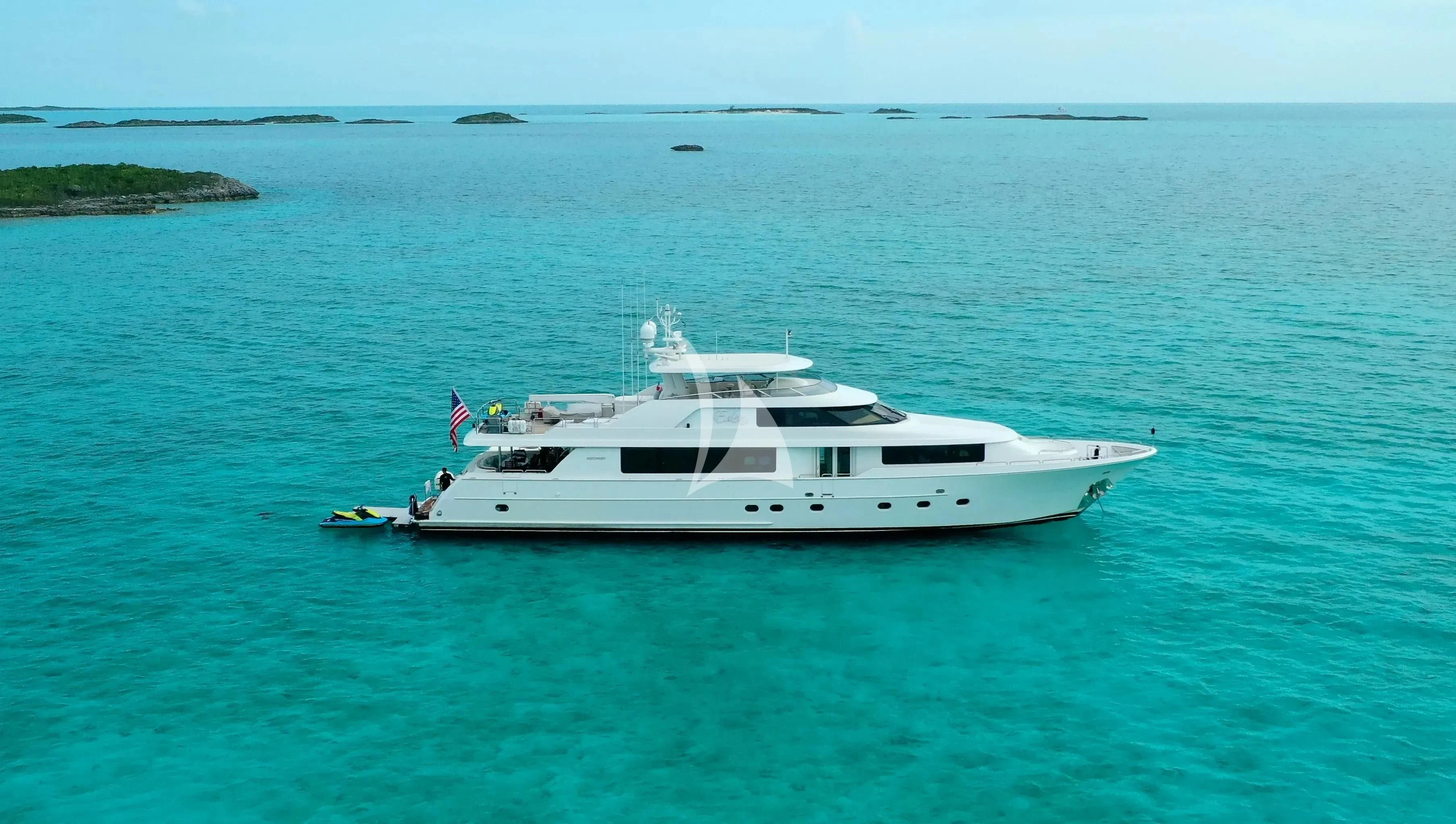 a white yacht in the ocean aboard EDEN Yacht for Sale