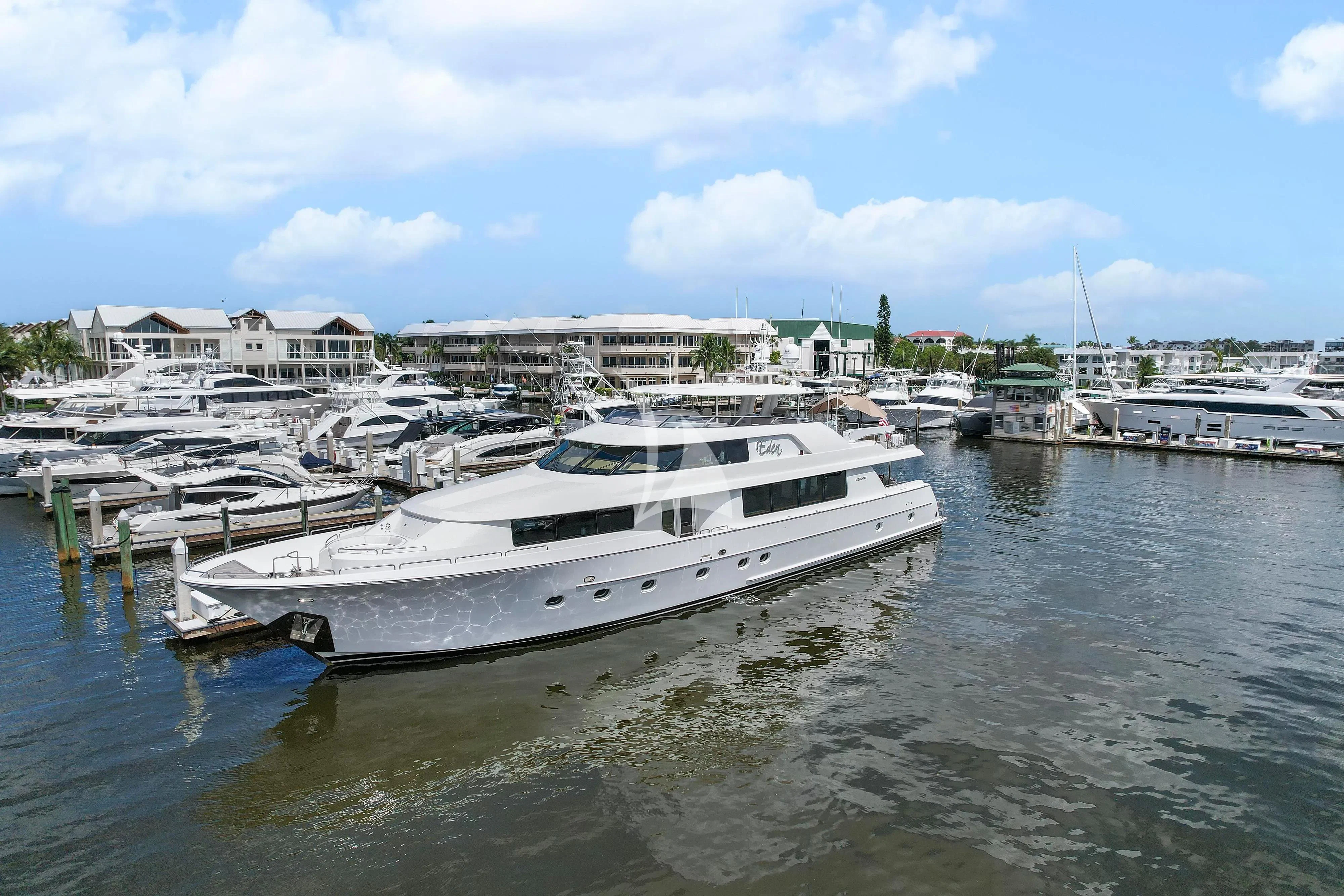 a boat docked at a pier aboard EDEN Yacht for Sale