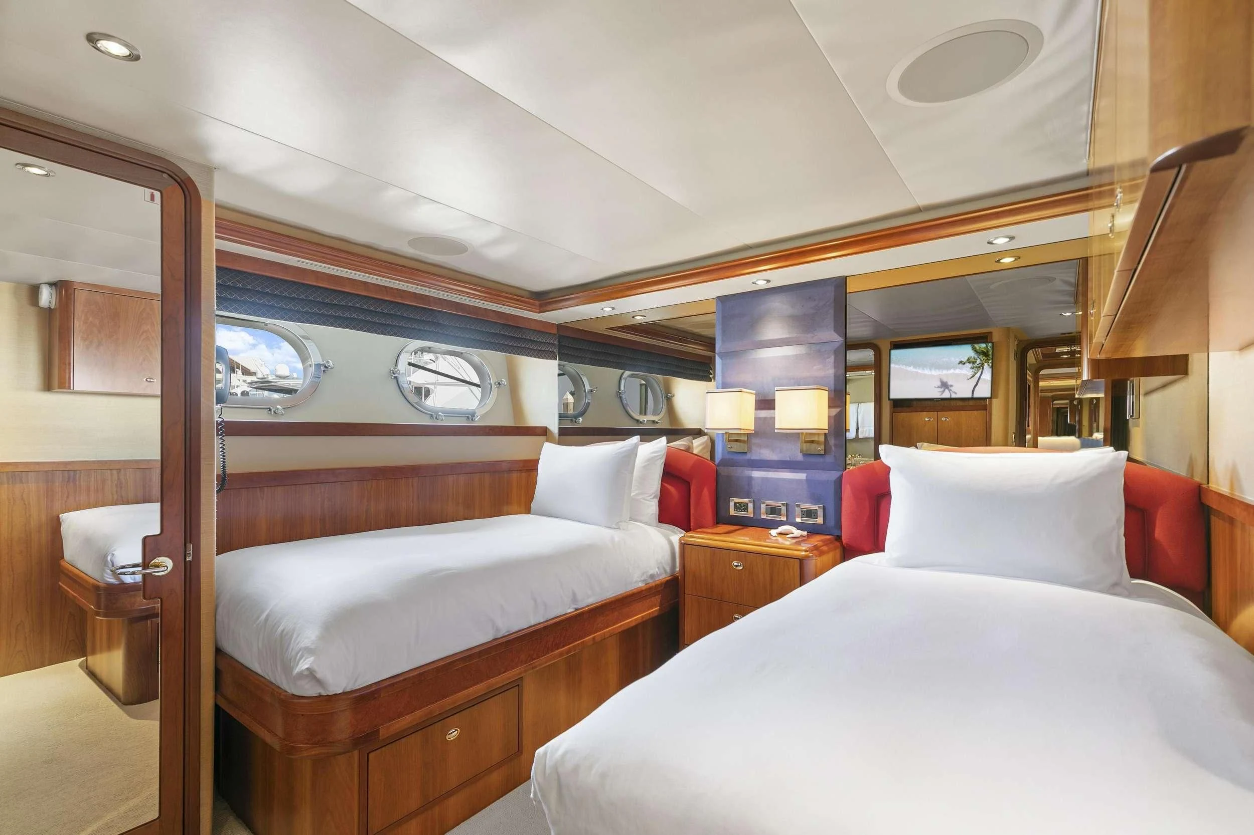 a room with two beds aboard EDEN Yacht for Sale