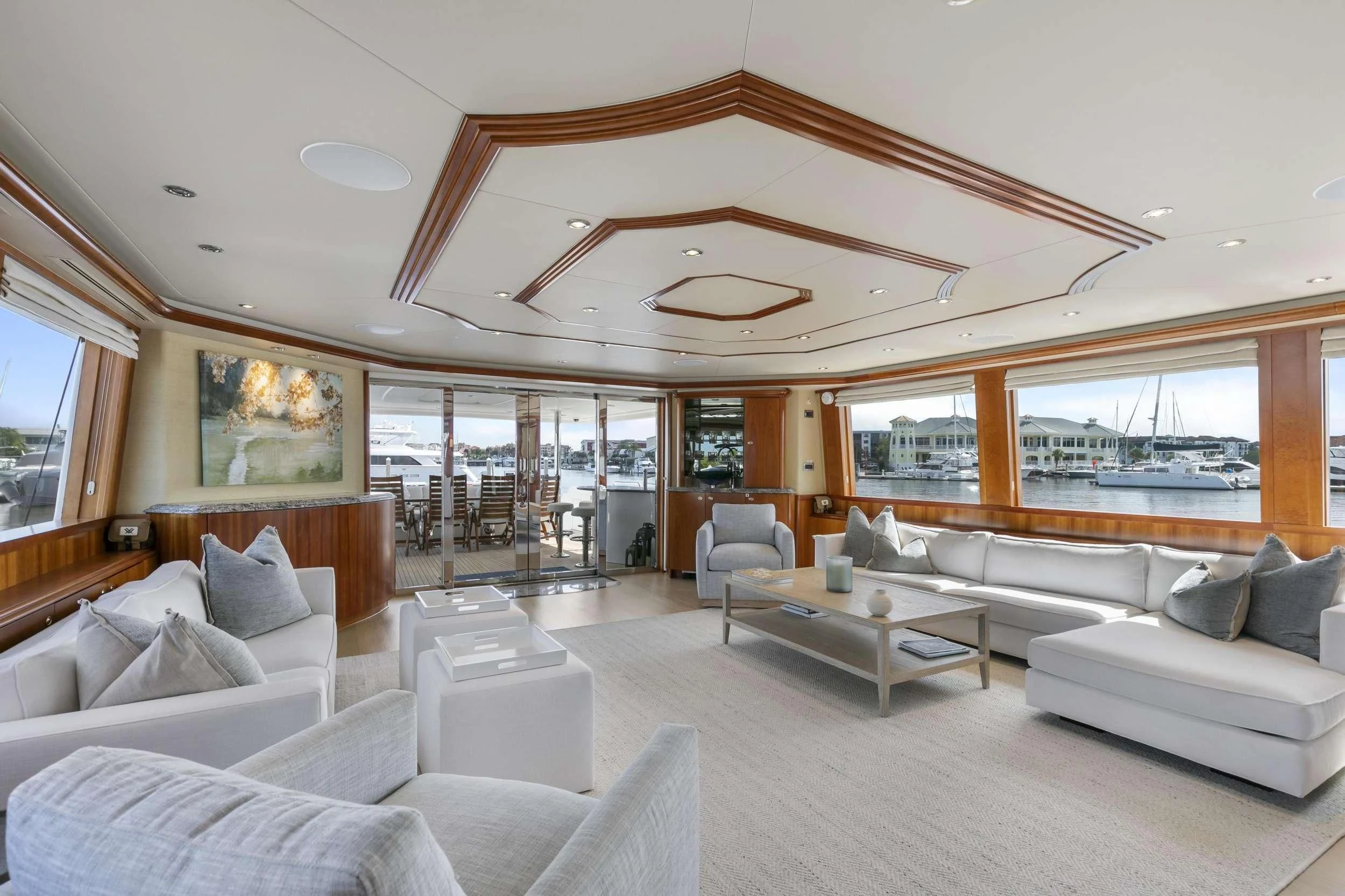 a living room with a large glass window aboard EDEN Yacht for Sale