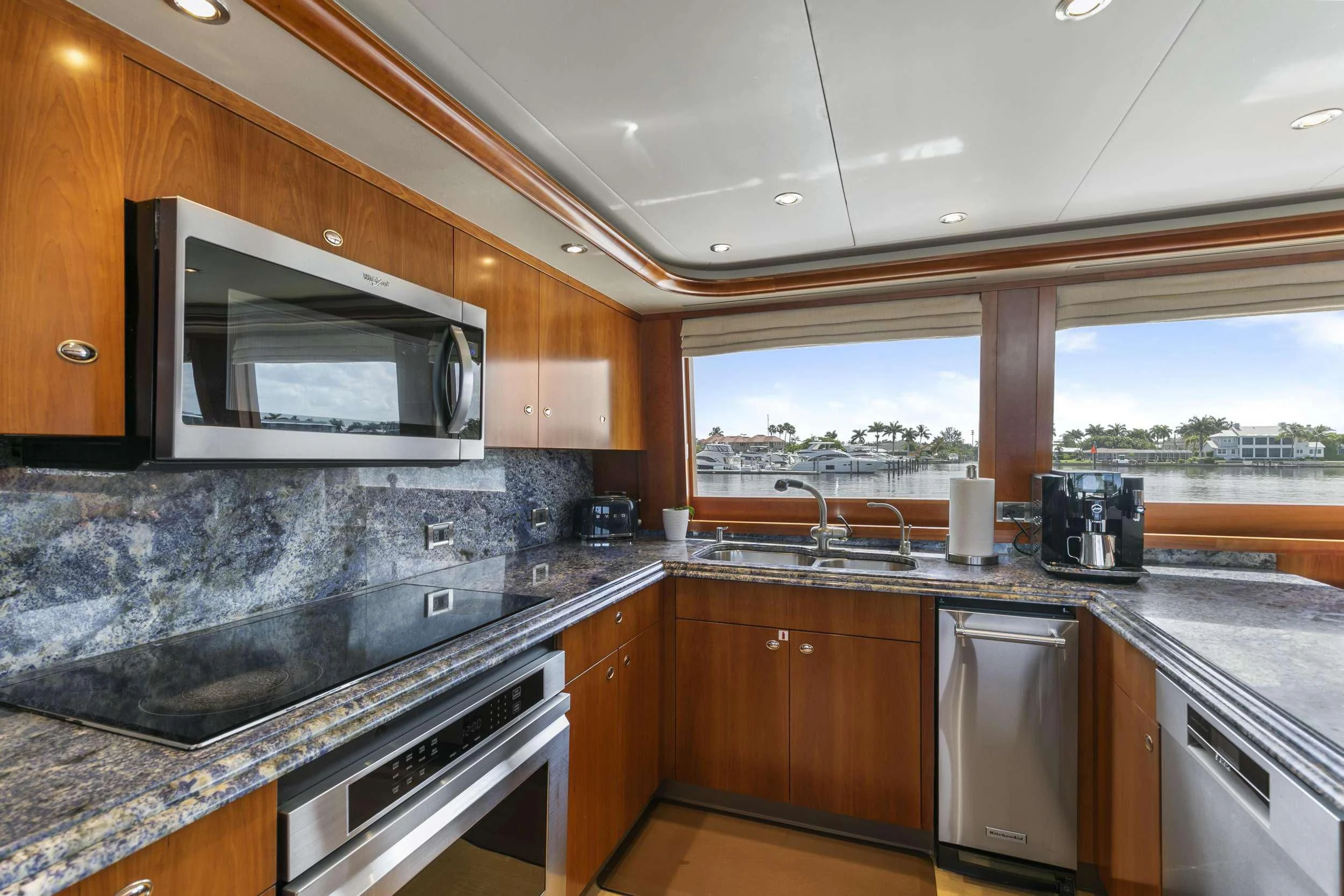 a kitchen with a large window aboard EDEN Yacht for Sale