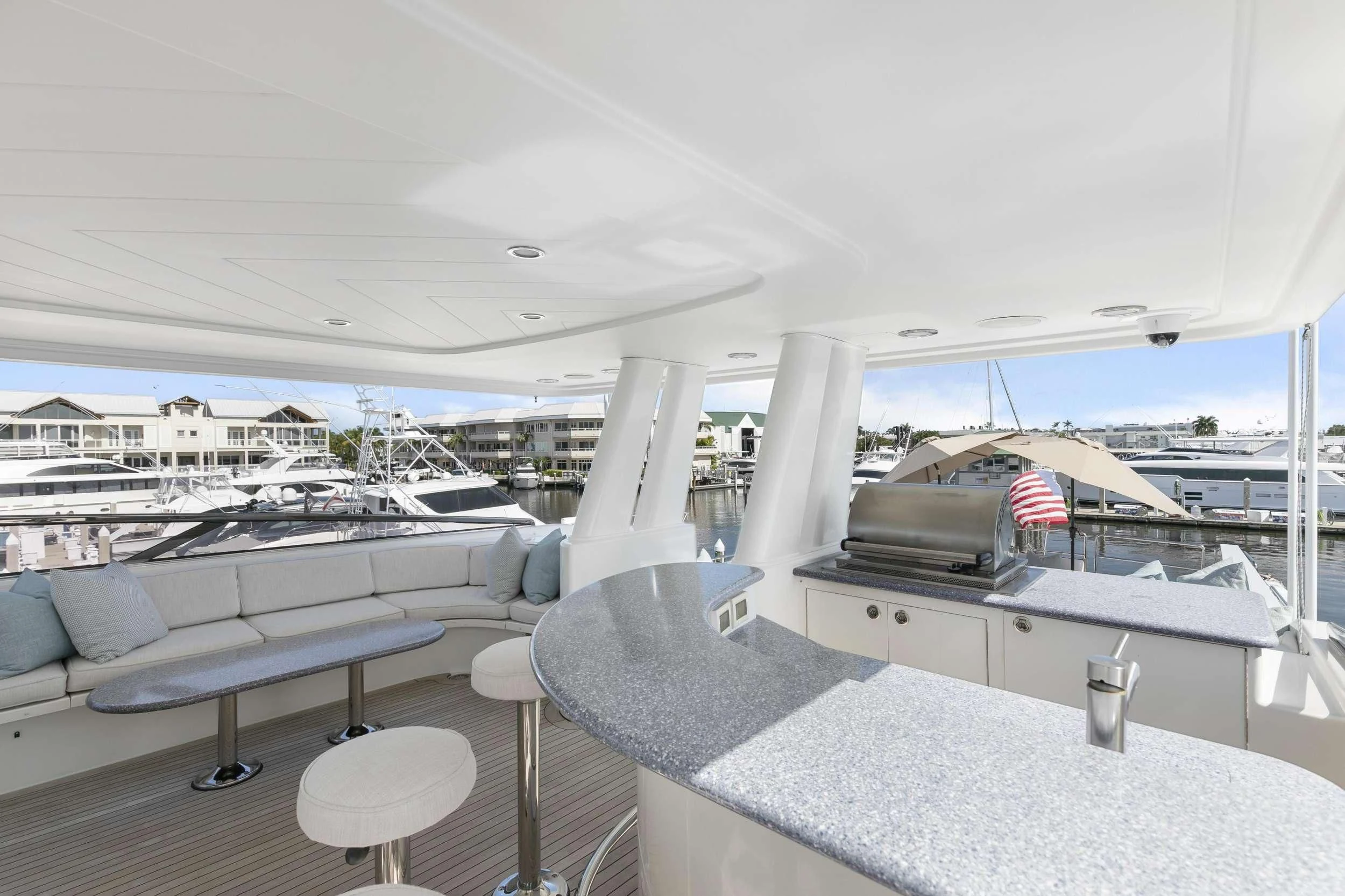 a large room with a table and chairs aboard EDEN Yacht for Sale