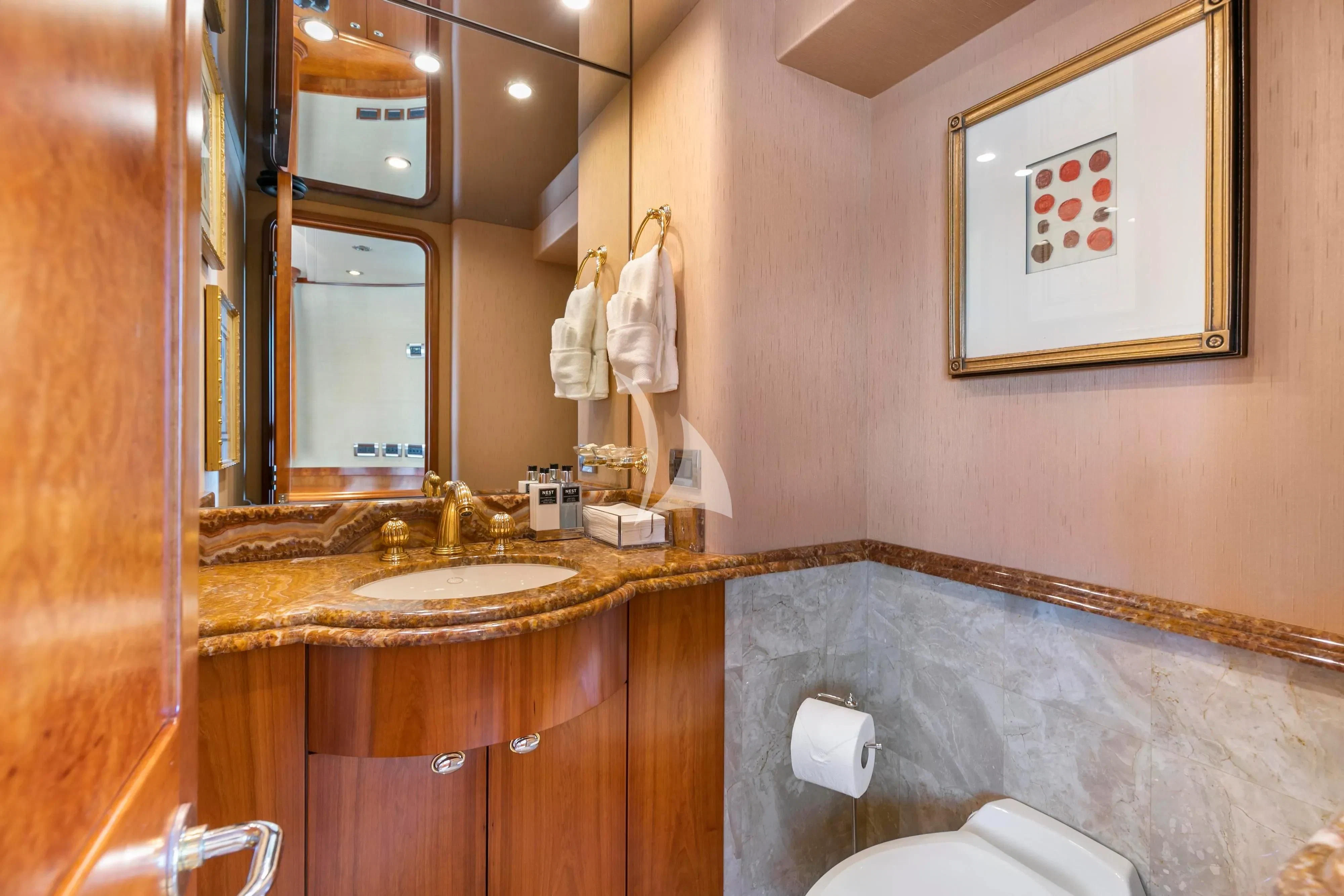 a bathroom with a large mirror aboard EDEN Yacht for Sale