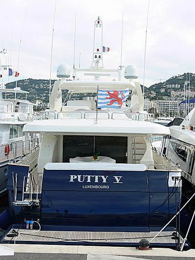 a boat docked at a pier aboard LULU Yacht for Sale