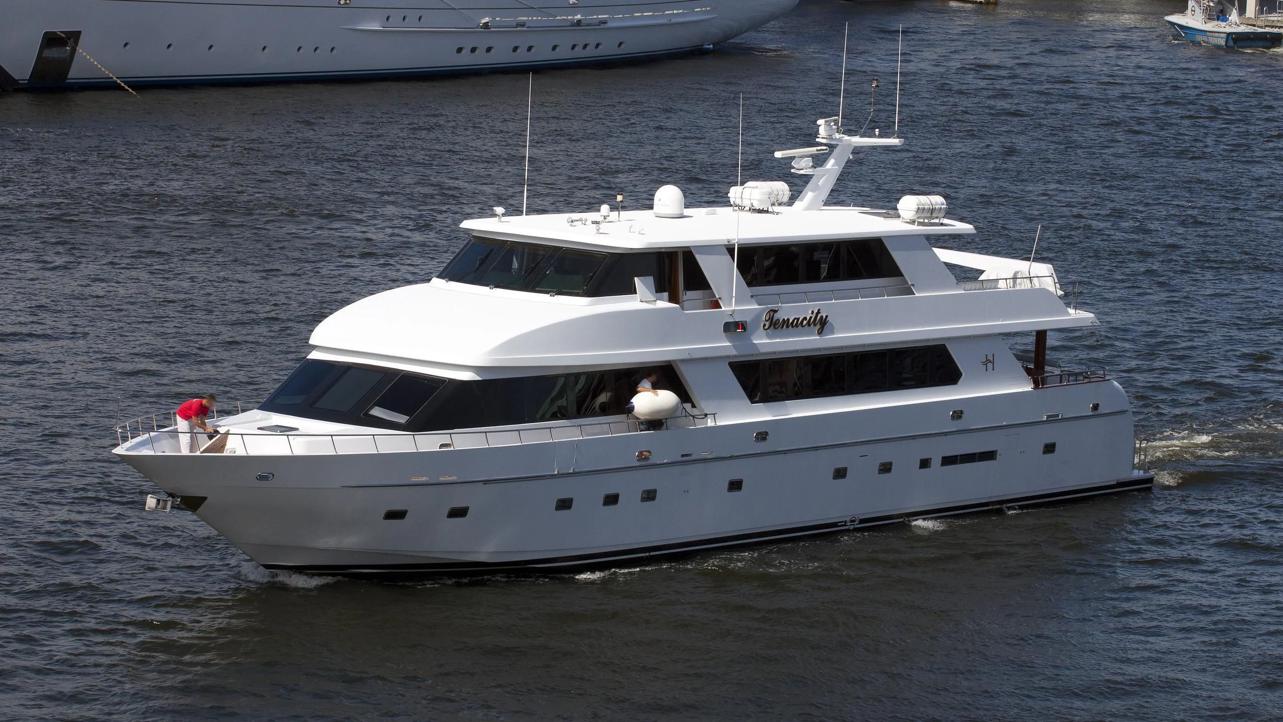a white yacht in the water aboard SEAS THE DAY Yacht for Sale