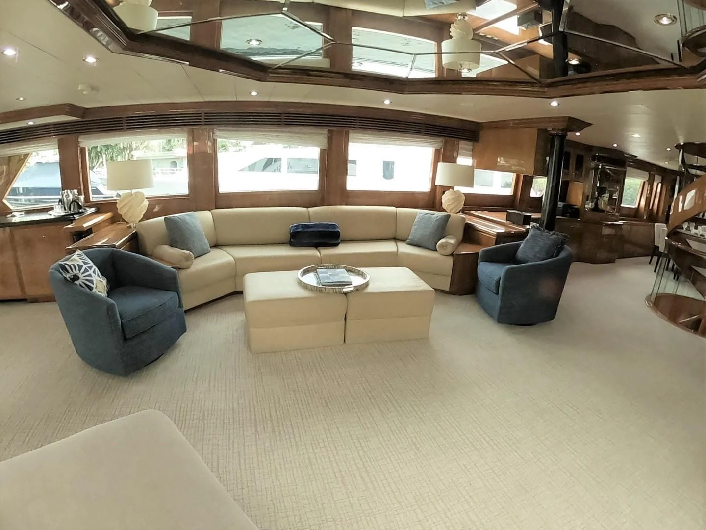 a room with a couch and a table aboard SEAS THE DAY Yacht for Sale