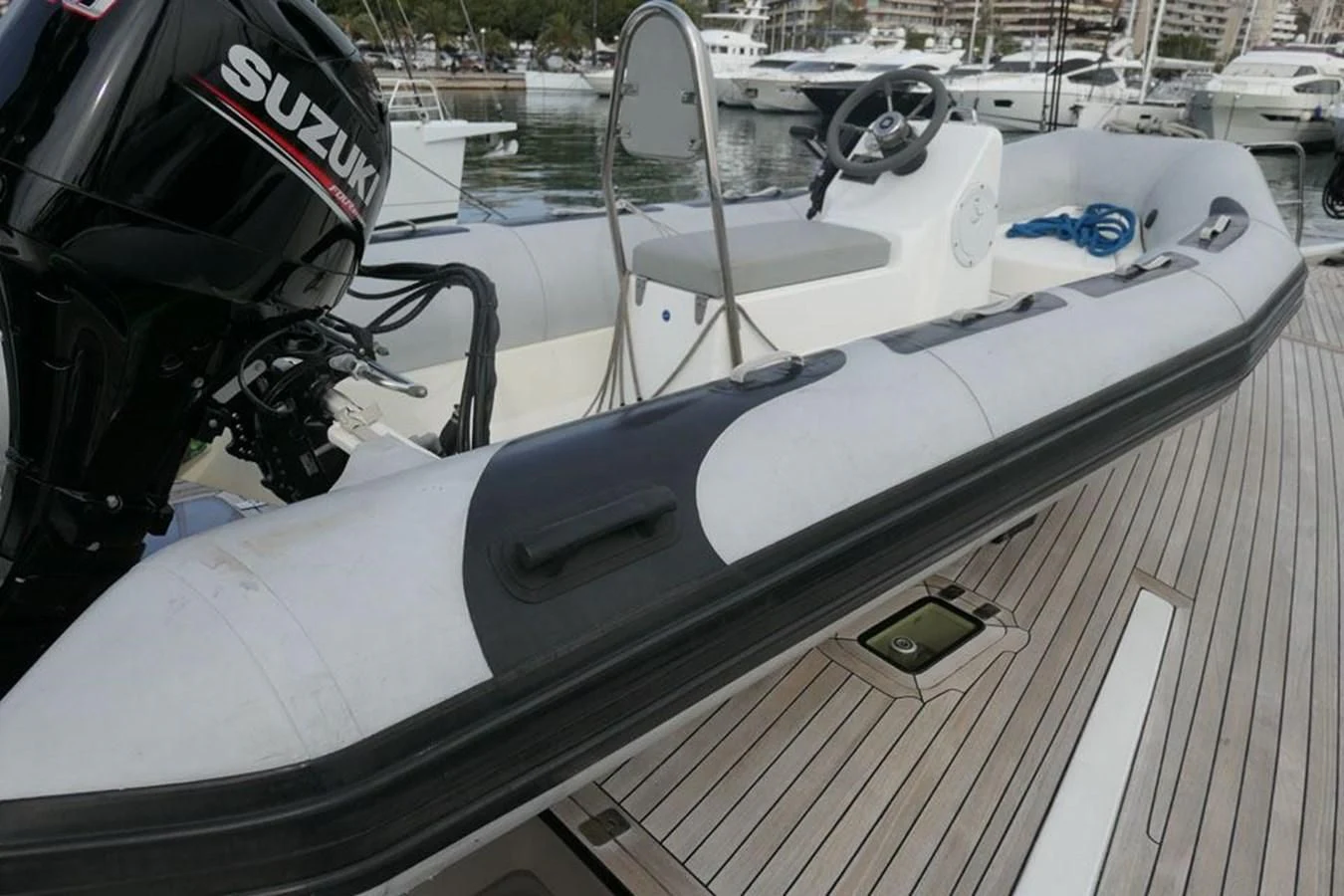 a motorboat on a deck aboard LA LUNA Yacht for Sale