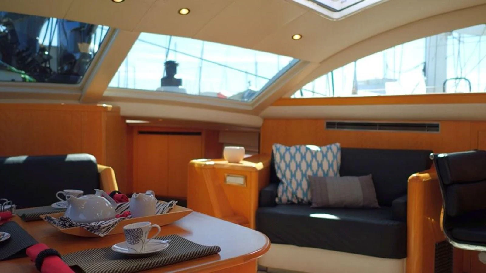 a room with a couch and a table aboard LA LUNA Yacht for Sale