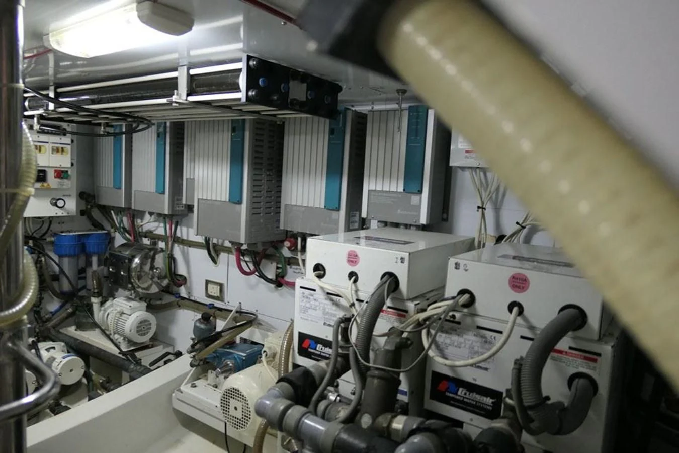 a room with several machines aboard LA LUNA Yacht for Sale