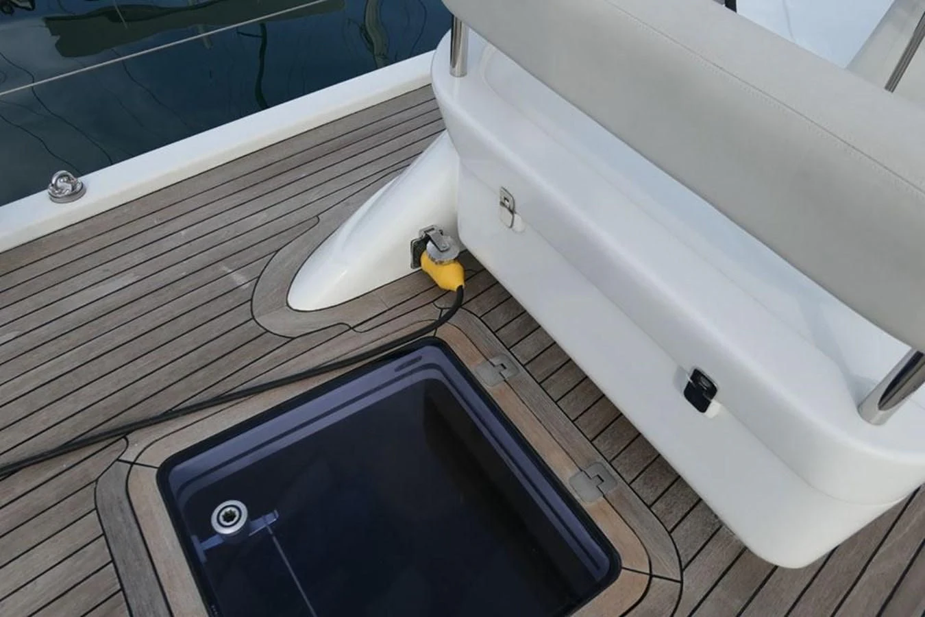 a white bathtub with a black tub and a black rectangular object aboard LA LUNA Yacht for Sale