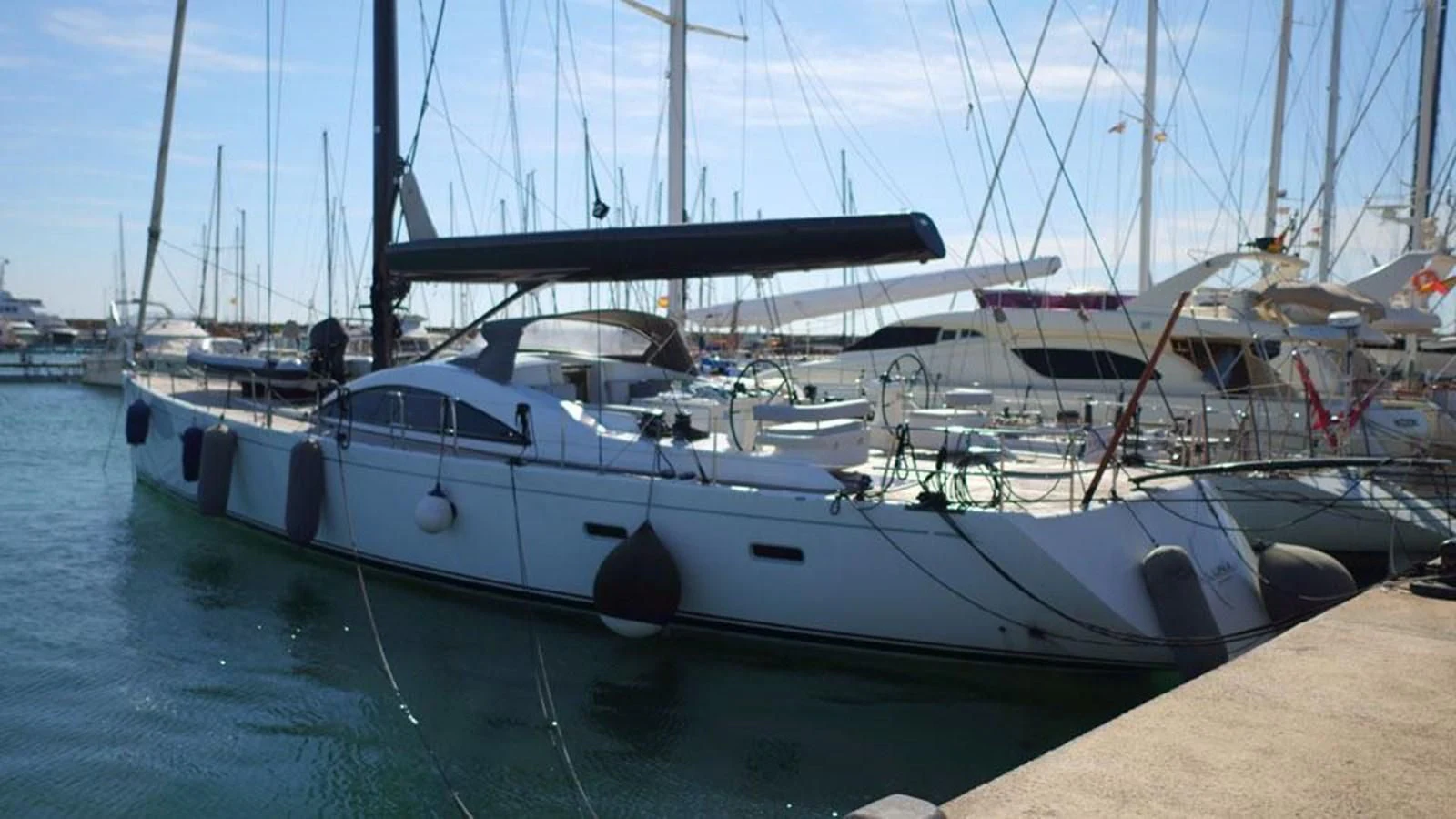 a boat docked at a pier aboard LA LUNA Yacht for Sale