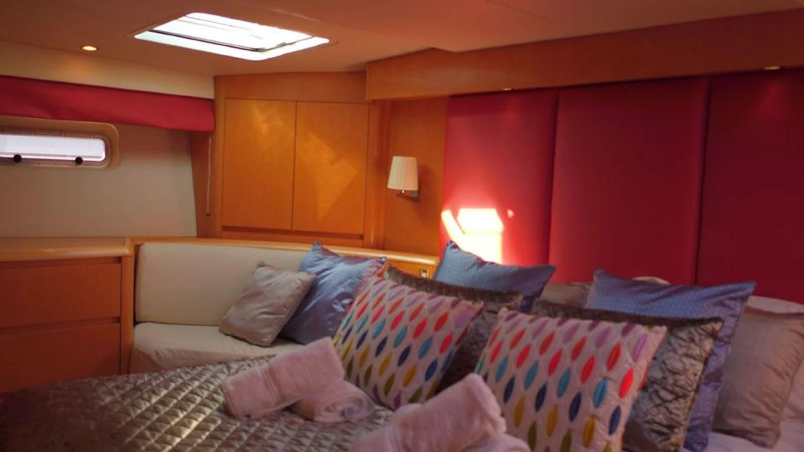 a bed with pillows and pillows aboard LA LUNA Yacht for Sale