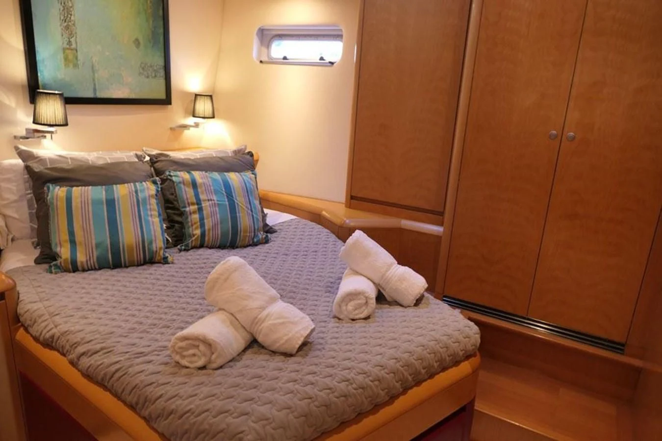 a bed with pillows and pillows aboard LA LUNA Yacht for Sale