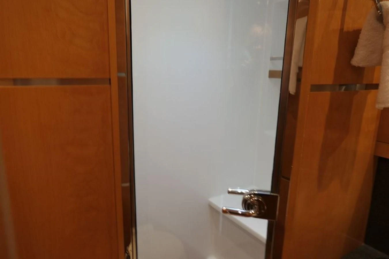 a door with a handle aboard LA LUNA Yacht for Sale