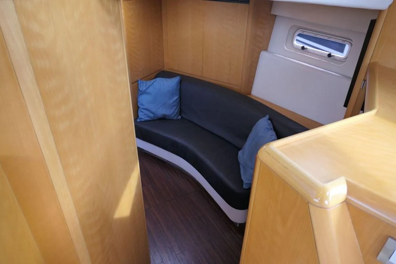 a couch in a room aboard LA LUNA Yacht for Sale