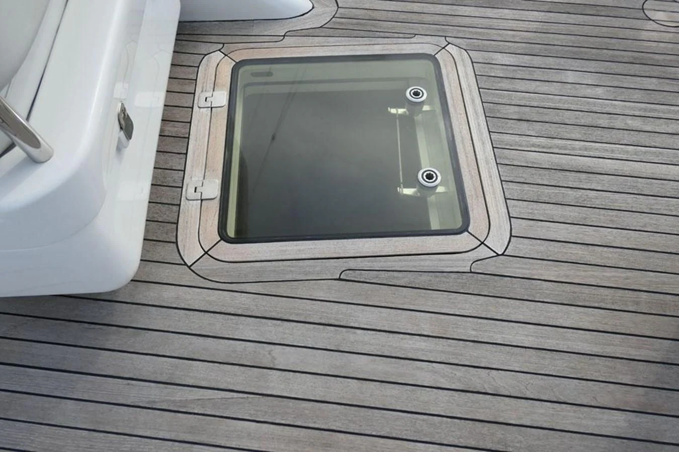 a cell phone on a wooden surface aboard LA LUNA Yacht for Sale