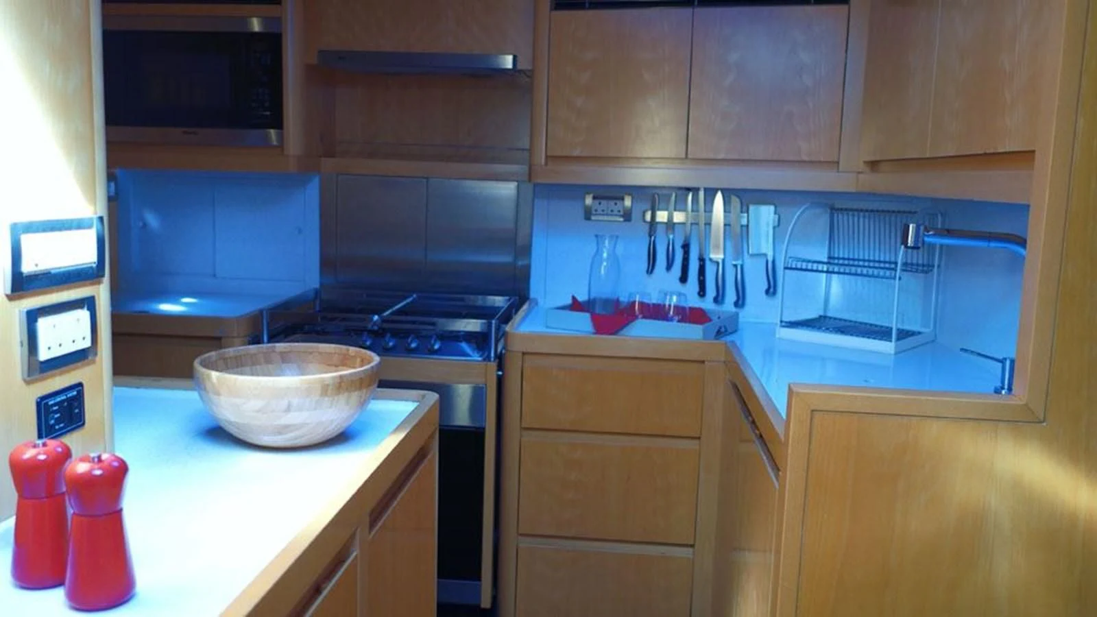a kitchen with a bowl and utensils aboard LA LUNA Yacht for Sale