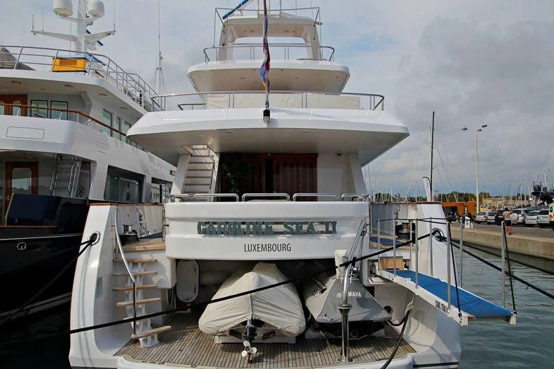 a boat docked at a pier aboard CAROLINE SEA II Yacht for Sale