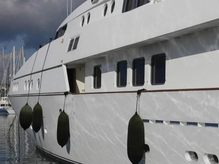 a white boat with black and white windows aboard CAROLINE SEA II Yacht for Sale