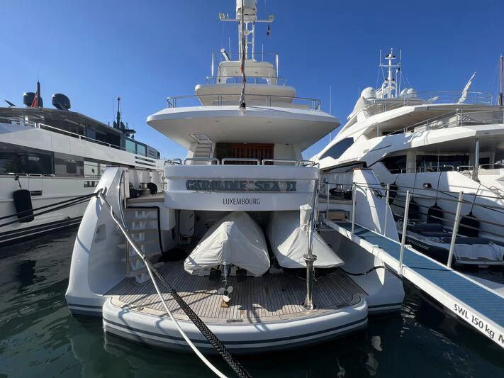 a group of boats are parked in a harbor aboard CAROLINE SEA II Yacht for Sale