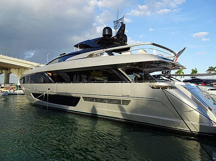 a white yacht docked aboard IRON GRYPHON Yacht for Sale