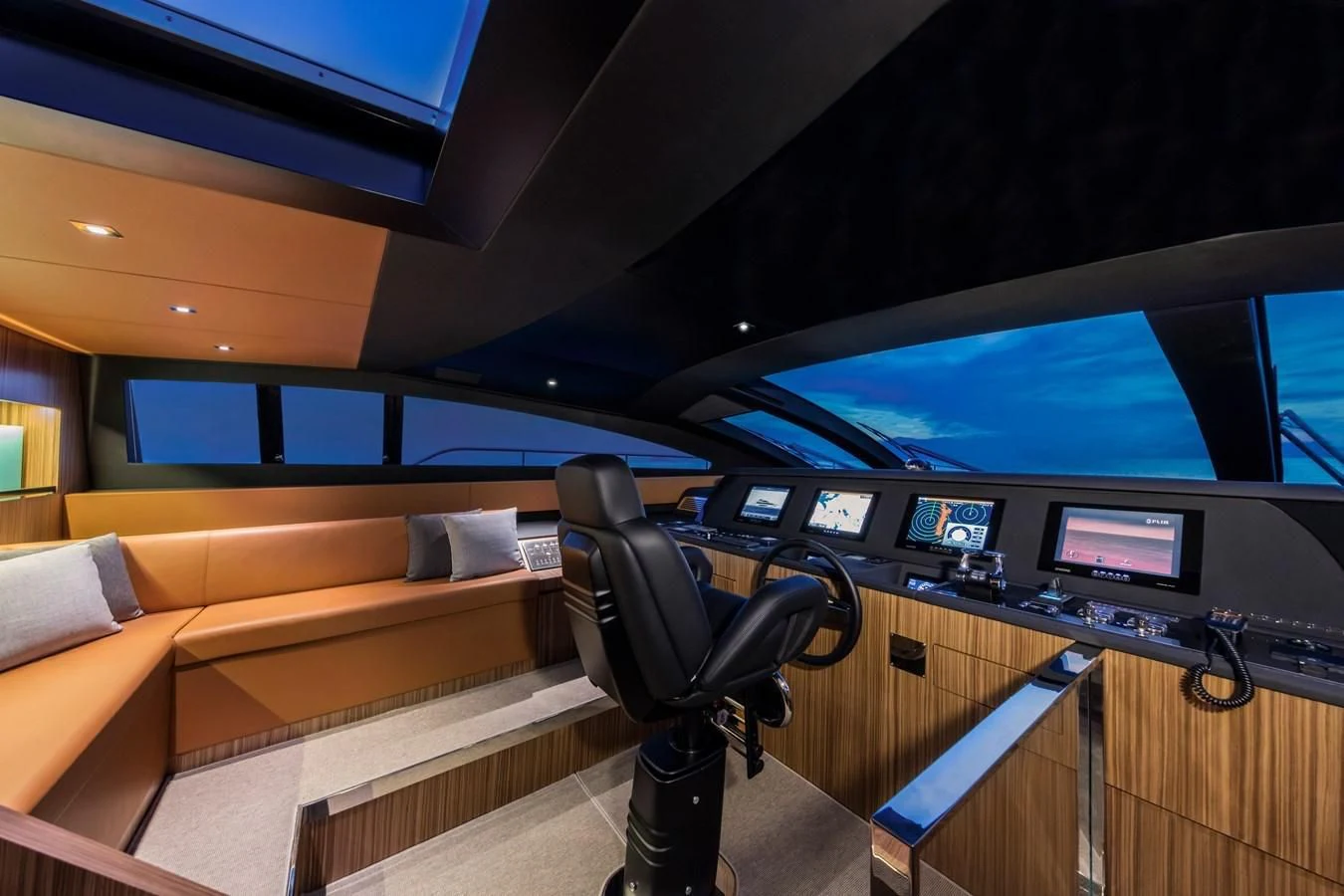a room with a couch and a tv aboard IRON GRYPHON Yacht for Sale