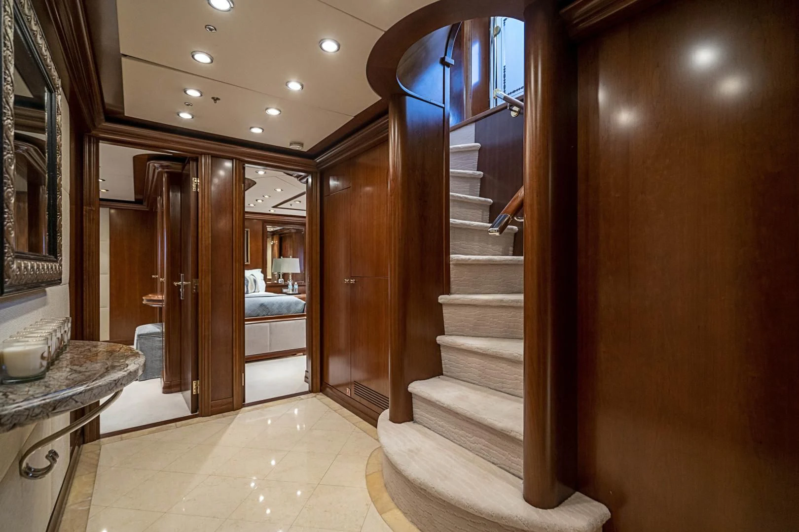 a bathroom with a large glass door aboard CAMILLE Yacht for Sale