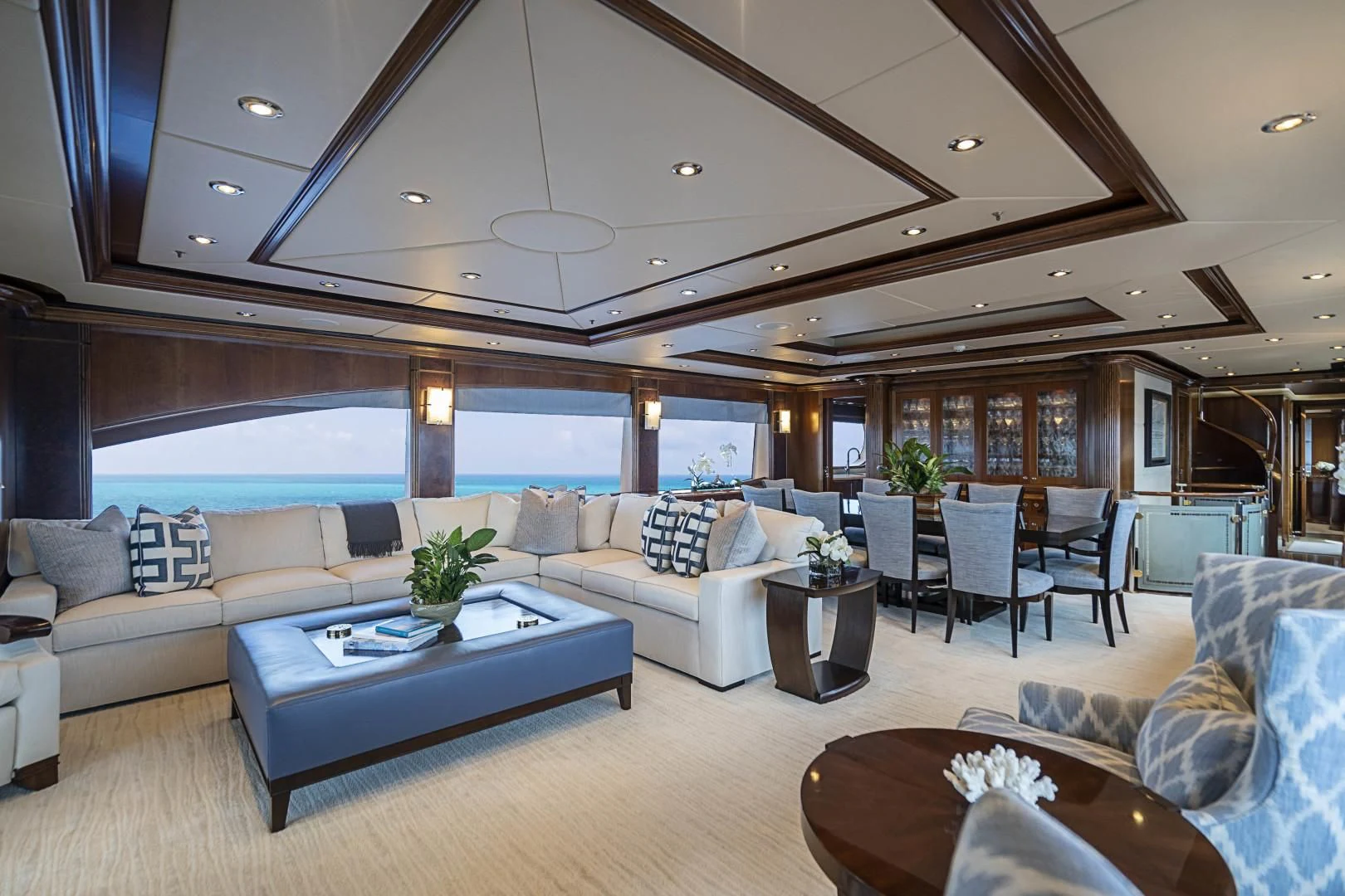a living room with a large window aboard CAMILLE Yacht for Sale