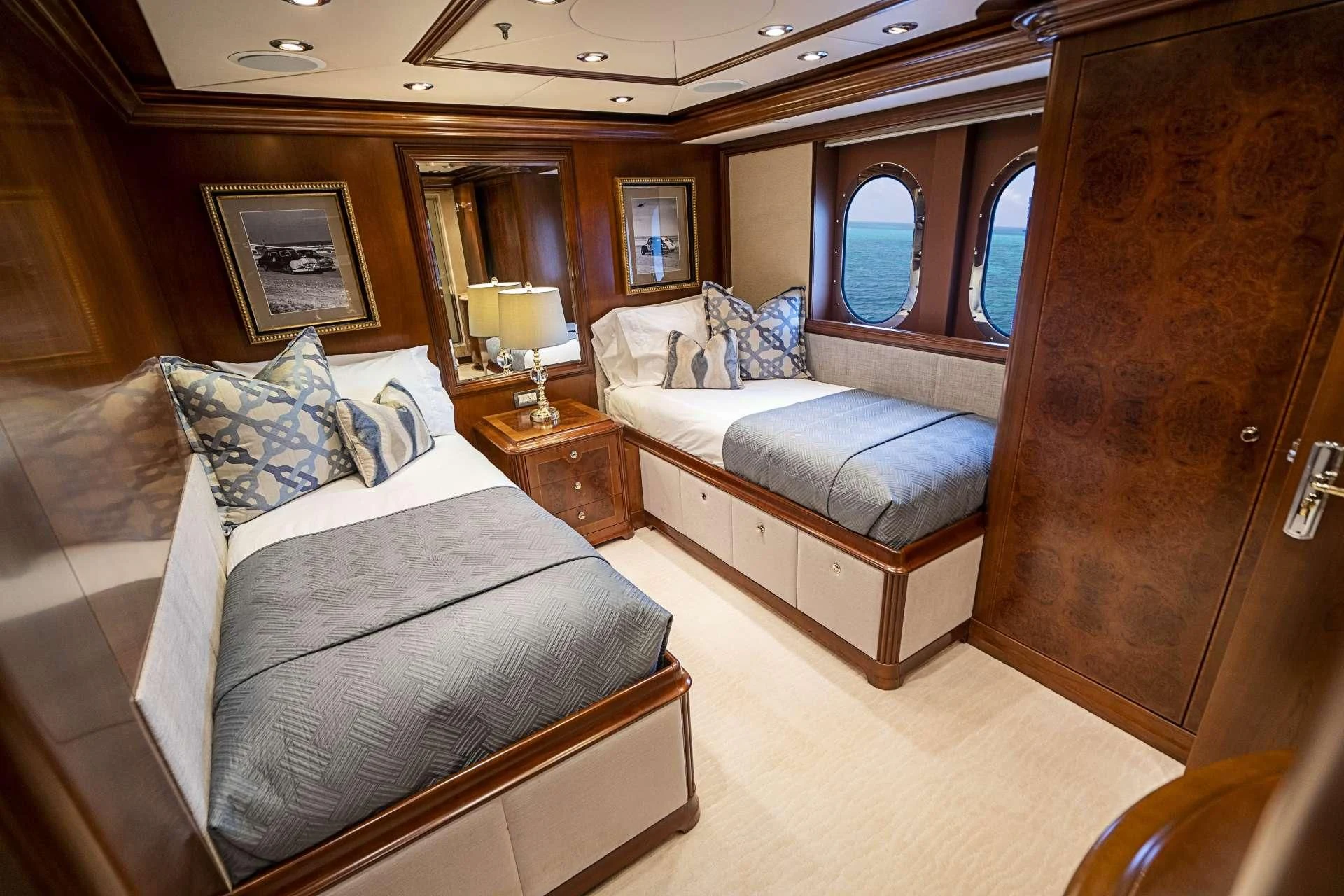 a room with a bed and a couch aboard CAMILLE Yacht for Sale
