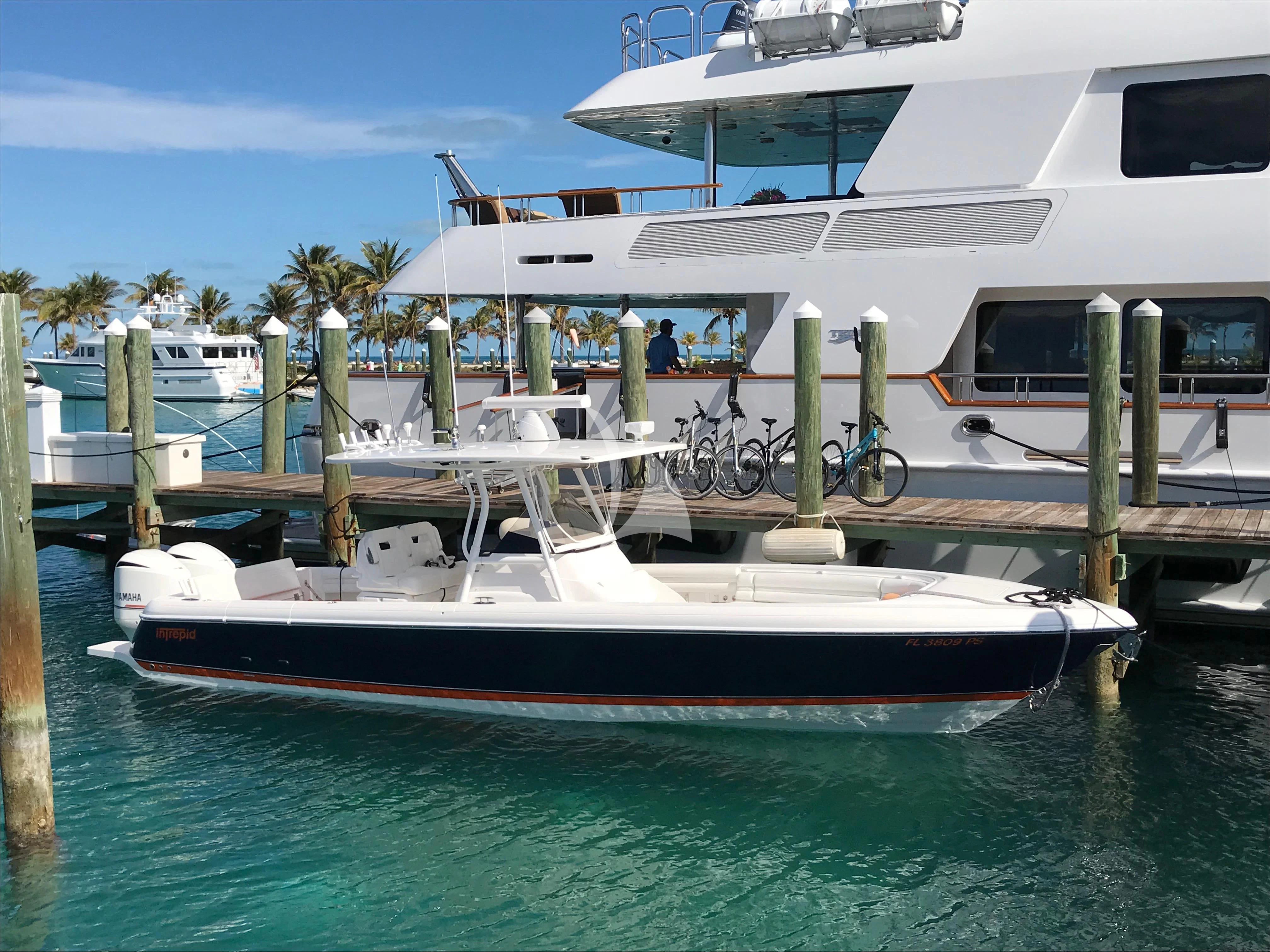 a boat docked at a pier aboard CAMILLE Yacht for Sale