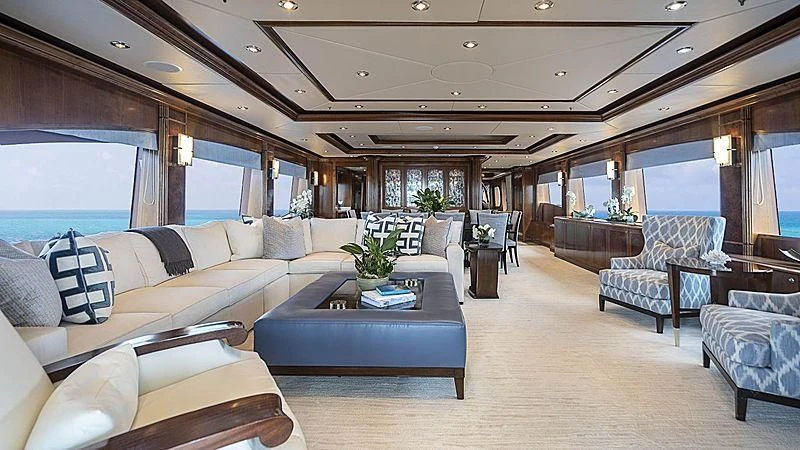 a living room with a large window aboard CAMILLE Yacht for Sale