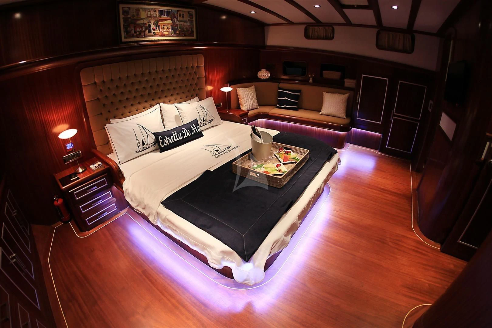 a bed room with a couch and a coffee table aboard ESTRELLA DE MAR Yacht for Sale