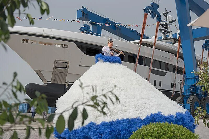 a person on a boat aboard PIACERE Yacht for Sale