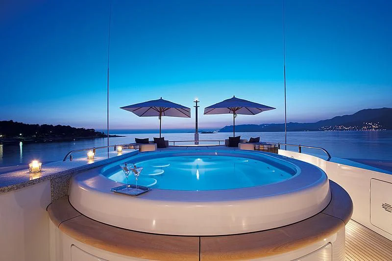 a pool with lights on the side aboard LA BLANCA Yacht for Sale