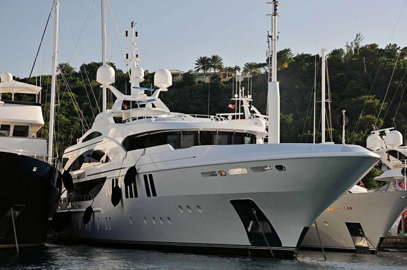 a boat parked in a harbor aboard LA BLANCA Yacht for Sale