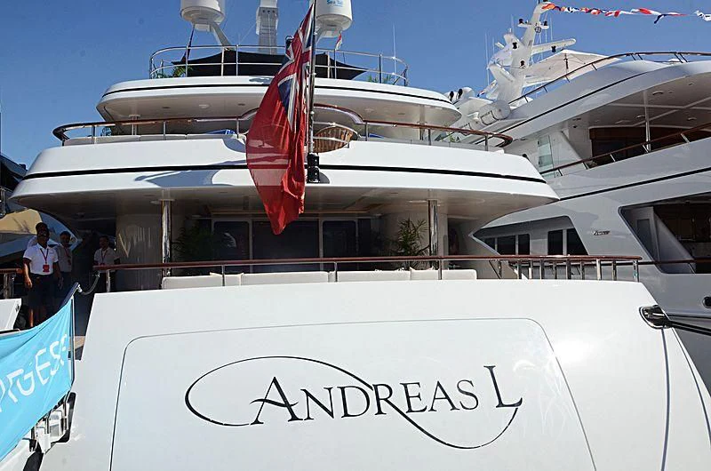 a boat with a flag on the front aboard LA BLANCA Yacht for Sale