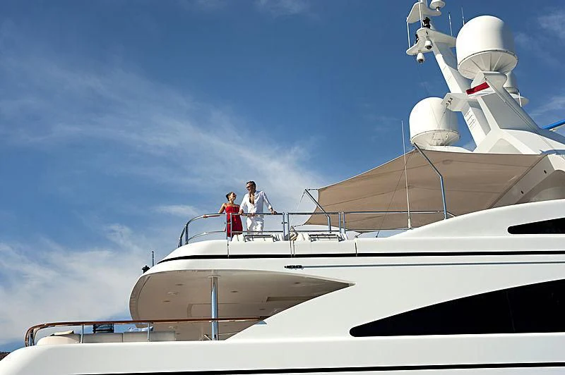 a couple of people on a boat aboard LA BLANCA Yacht for Sale