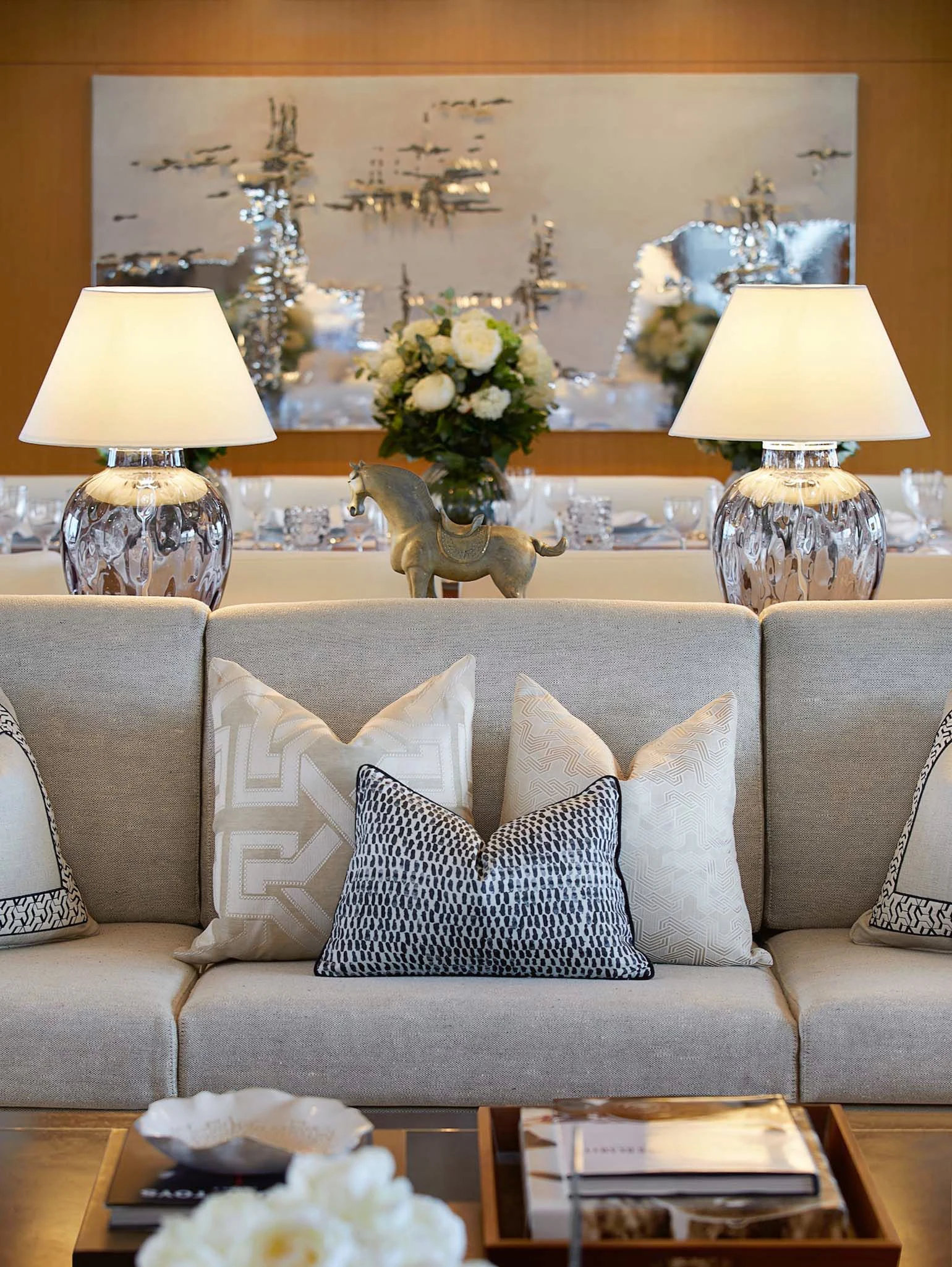 a living room with a large mirror aboard LA BLANCA Yacht for Sale