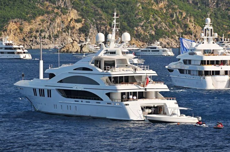 a couple of white yachts in the water aboard LA BLANCA Yacht for Sale