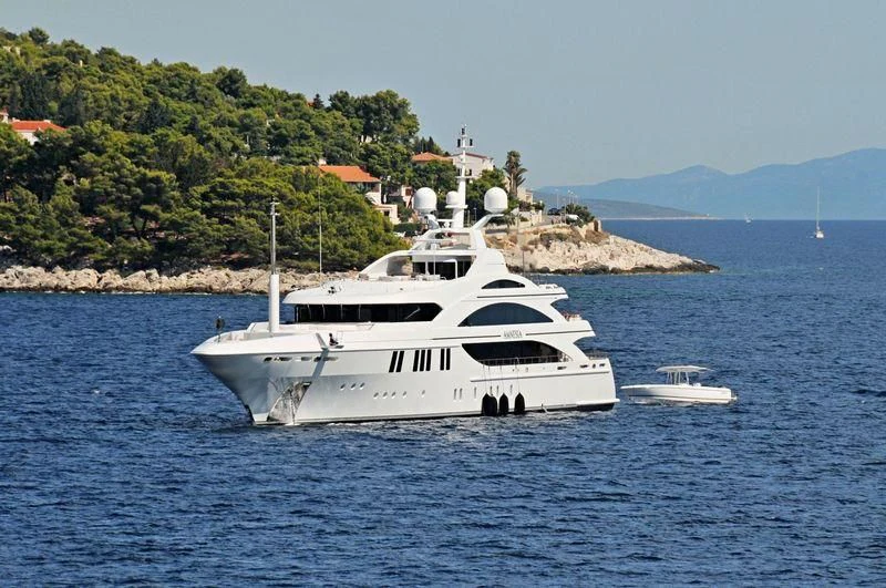 a white yacht in the water aboard LA BLANCA Yacht for Sale