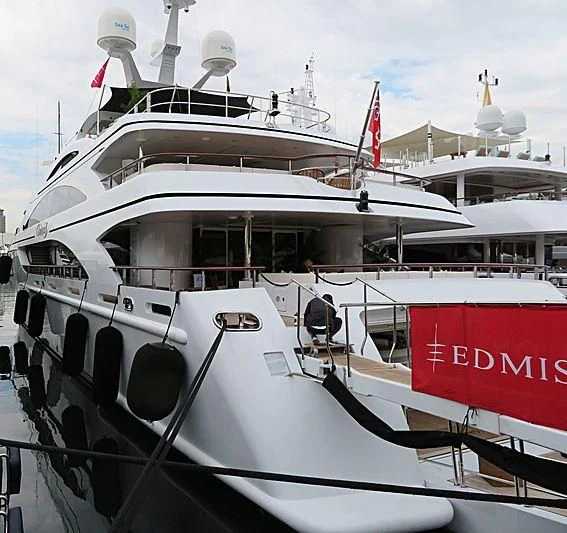 a white yacht with red trim aboard LA BLANCA Yacht for Sale